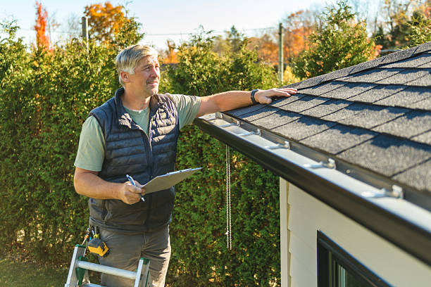 Professional Roof Replacement technician working in South Walpole, MA